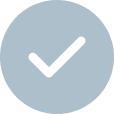 A blue circle with a white checkmark inside.